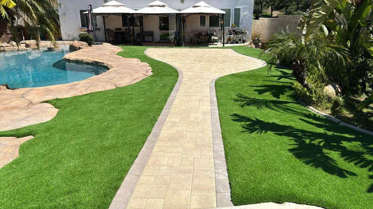 Finished Corona backyard with turf, pavers, and pool