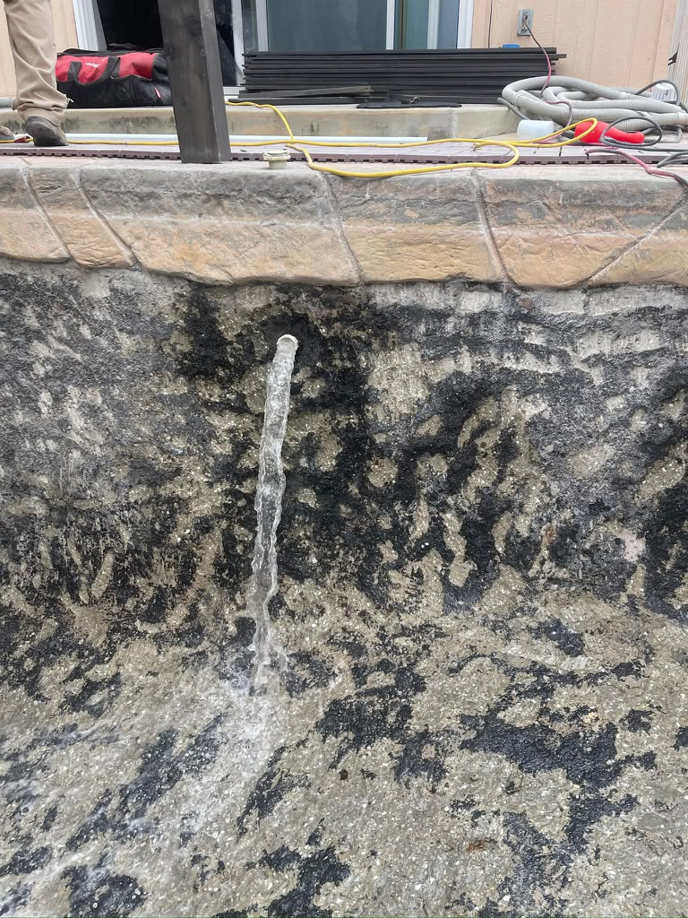 Close view of the failed pebble surface on the Whittier pool