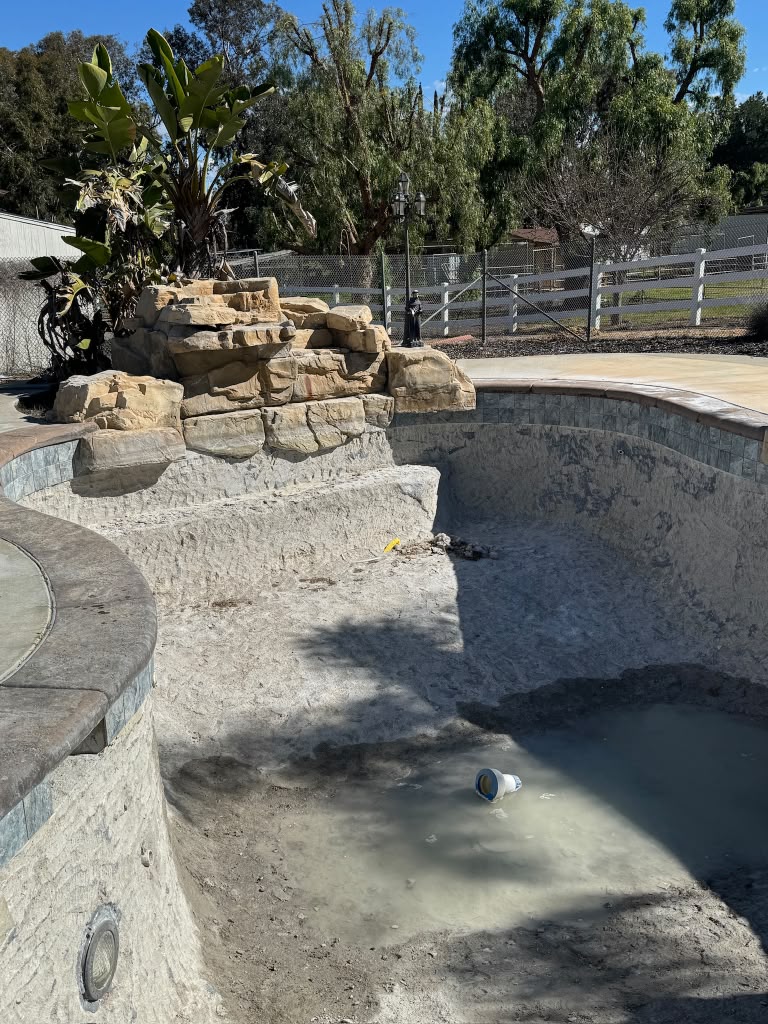 Empty Riverside pool shell before the replaster